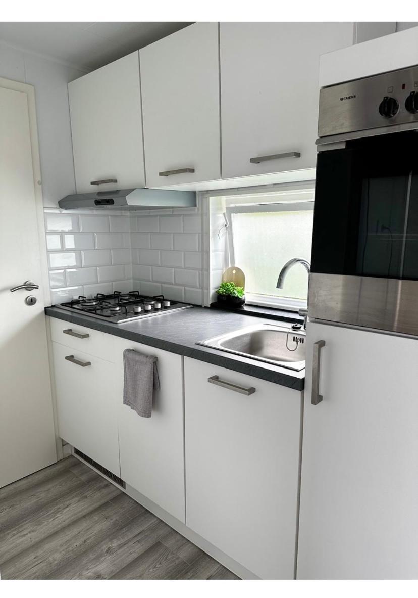 Gezellige Chalet In Lithse Ham Bagian luar foto